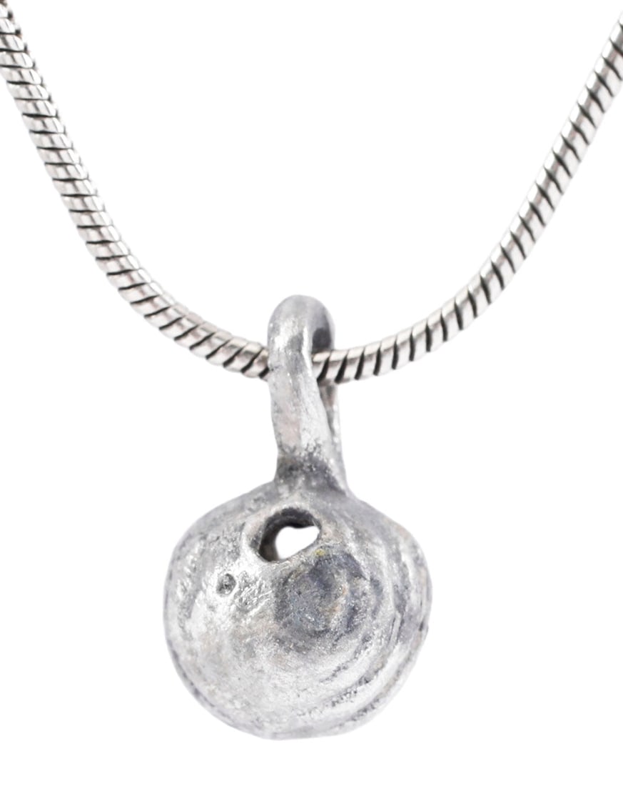 ANCIENT ROMAN WOMAN'S PENDANT NECKLACE, 1ST-3RD CENTURY: These small pendants were popular among common women in ancient Rome. Some have been described as prostitutes' pendants and that view is widely published on the internet. This example is 7.9mm, under