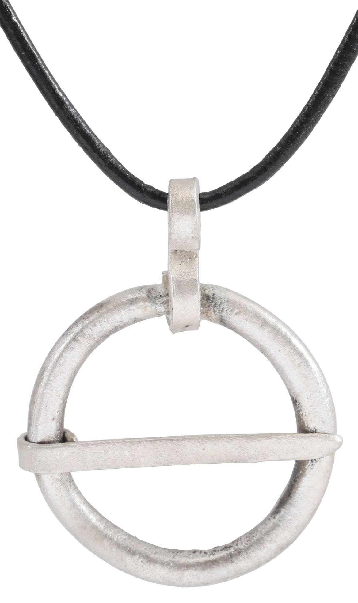 VIKING PROTECTIVE BROOCH PENDANT, 10th-11th CENTURY: Silvered bronze, just over 1 1/8" diameter (1.20"). Circular and circular section. The surface with light texture from burial. Professionally conserved and the silver surface restored. On a Sterling