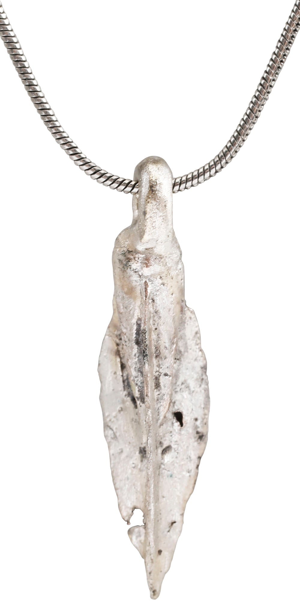 FINE GREEK ARROWHEAD PENDANT NECKLACE, C.8th-3rd CENTURY BC: Just over 1 1/8" length plus the loop. Finely made with tapered conical socket supporting triple angled veins forming the trilobate point. Excellent excavated condition with frosty surface from burial