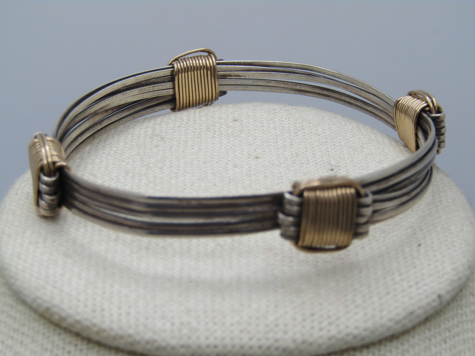 Vintage Sterling and 10KT G.F. Bracelet, 5 Bands, Slides to Adjust - Unisex: Title: Vintage Sterling and 10KT G.F. Bracelet, 5 Bands, Slides to Adjust - Unisex Description: Vintage Sterling and 10KT G.F. Bracelet, 5 Bands, Slides to Adjust - Unisex. T his is hand made and made