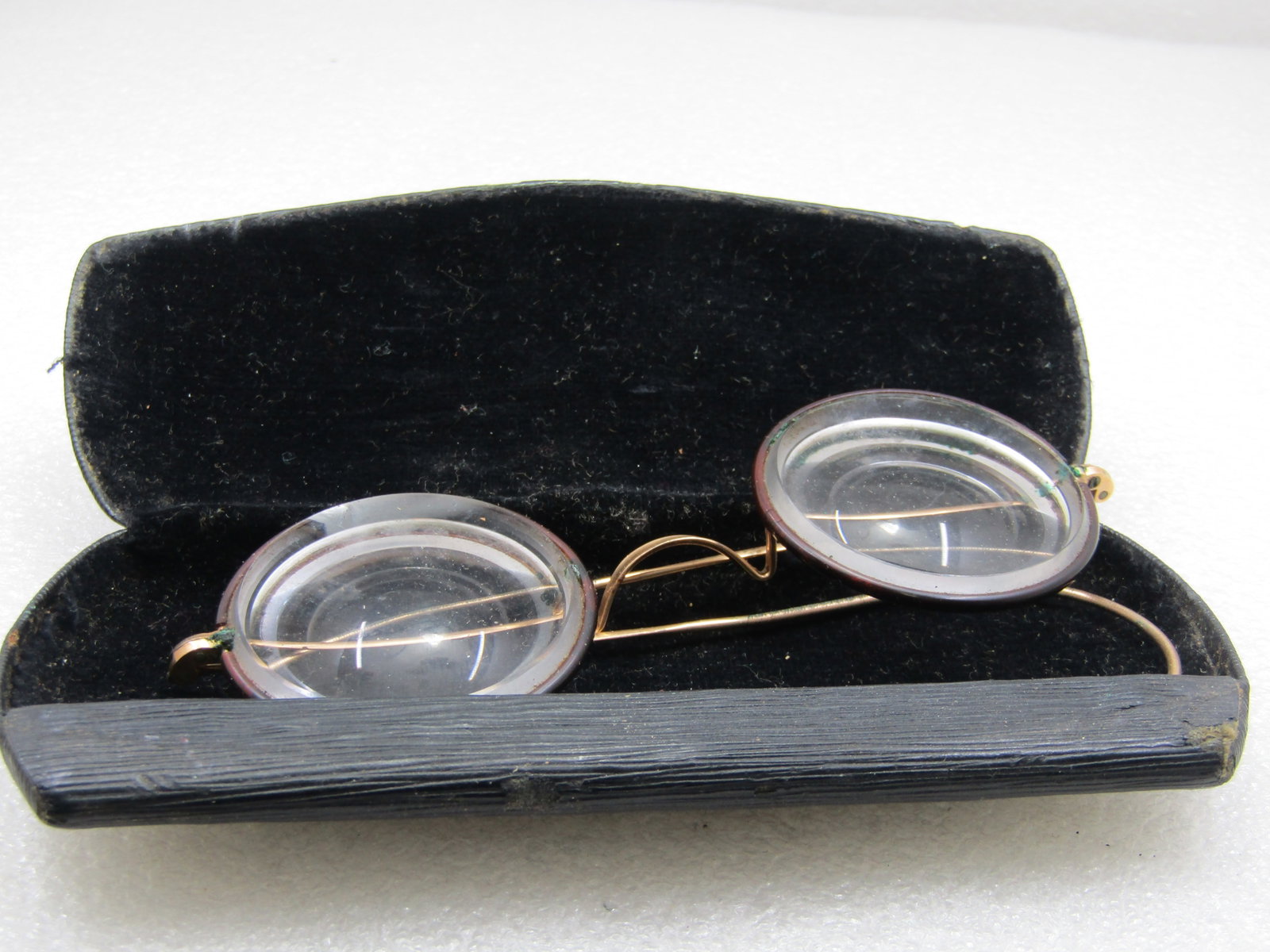 Vintage G.F. Shur-On Eye Glasses in Case, Very Thick, 4.5": Title: Vintage G.F. Shur-On Eye Glasses in Case, Very Thick, 4.5" Description: Vintage G.F. Shur-On Eye Glasses in Case, Very Thick, 4.5". The frame is gold filled, round lenses that are appx. 42mm ac