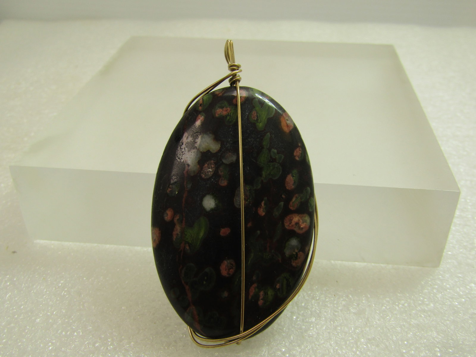 Wrapped Plum Blossom Jasper Pendant, 10kt G.F. Wire, 1980's-1990's: Title: Wrapped Plum Blossom Jasper Pendant, 10kt G.F. Wire, 1980's-1990's Description: Wrapped Plum Blossom Jasper Pendant, 10kt G.F. Wire, 1980's-1990's. T his is a large pendant with a stone that