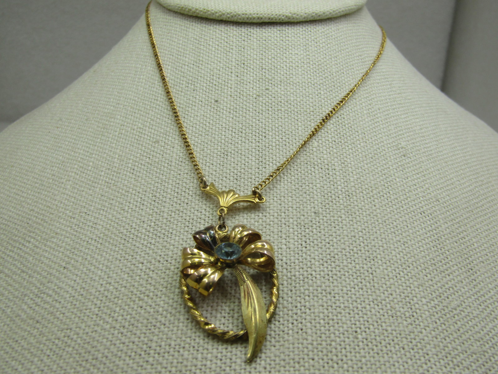 Vintage 12kt G.F. Rhinestone Lavalier Necklace, 18": Title: Vintage 12kt G.F. Rhinestone Lavalier Necklace, 18" Description: Vintage 12kt G.F. Rhinestone Lavalier Necklace, 18" This is marked 1/10 12kt G.F. on the squeeze clasp. Yellow gold with a ridge