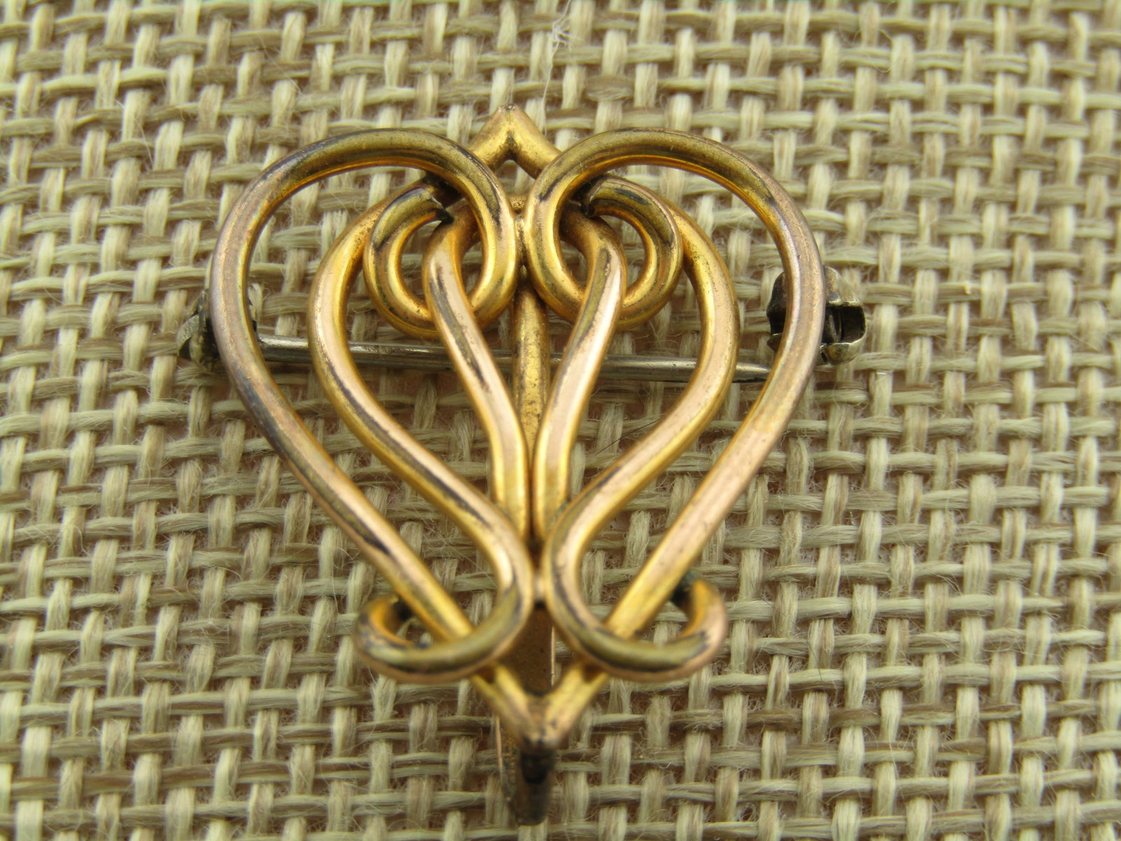 Vintage 10kt G.F. Scrolled Pocket Watch Holder Brooch, 1930's-1940's, Signed: Title: Vintage 10kt G.F. Scrolled Pocket Watch Holder Brooch, 1930's-1940's, Signed Description: Vintage 10kt G.F. Scrolled Pocket Watch Holder Brooch, 1930's-1940's, Signed L.J.A. Co. . It has a scro