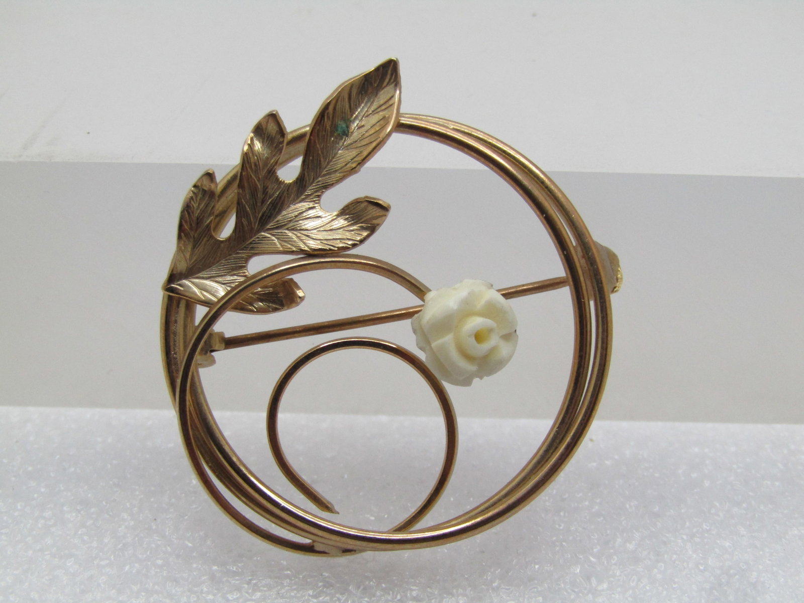 Vintage Spiral Carved Rose Brooch,10kt G.F., 1960's-1970's: Title: Vintage Spiral Carved Rose Brooch,10kt G.F., 1960's-1970's Description: Vintage Spiral Carved Rose Brooch,10kt G.F., 1960's-1970's. Tests as 10kt G.F./plated. It has a single white carved rose 