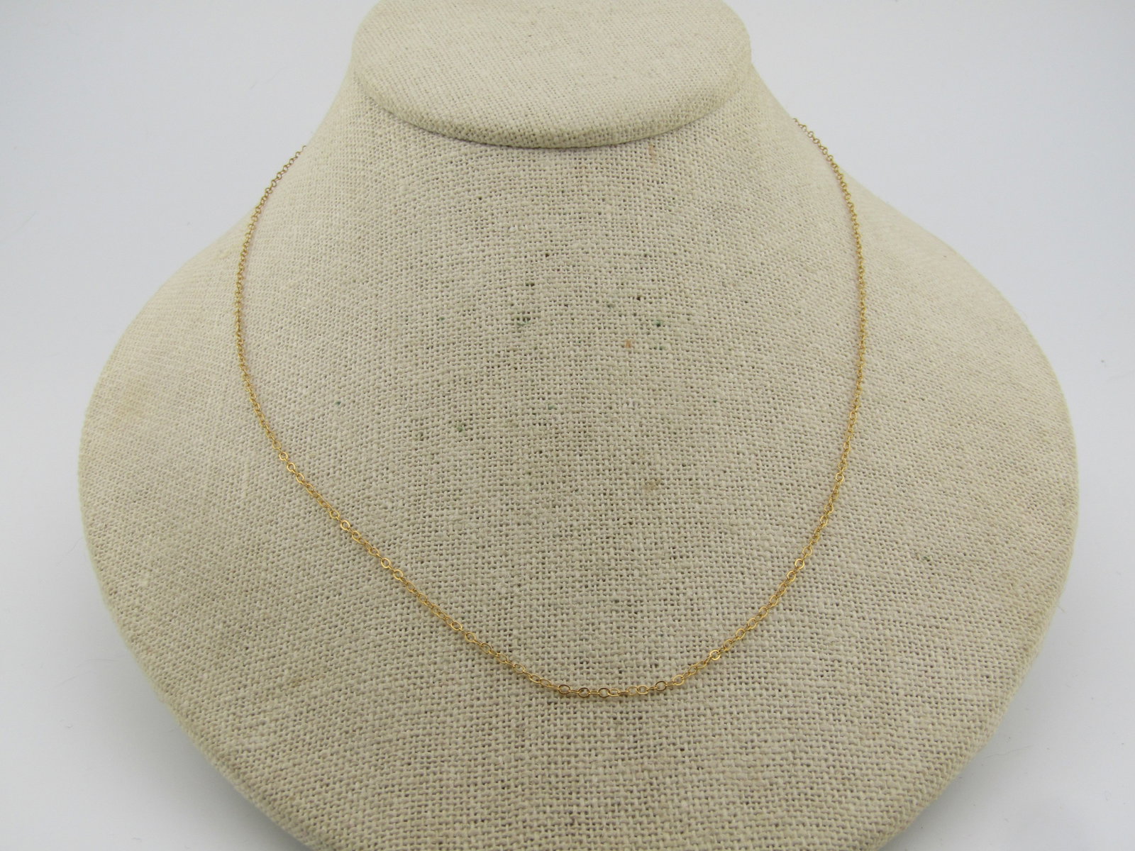 1/20 12kt Gold Filled Chain, 16"-18", Signed NC, 1990's: Title: 1/20 12kt Gold Filled Chain, 16"-18", Signed NC, 1990's Description: 1/20 12kt Gold Filled Chain, 16"-18", Signed NC, 1990's. This chain is an alternating oval link and is appx. 1.3mm wide.