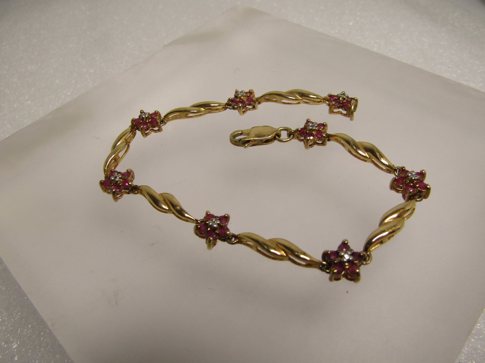 Vintage Scrolled 12kt GF Horseshoe Brooch, 1960's-1970's, Signed 2 Winard. This is appx. 1-7/8" by: Title: Vintage Scrolled 12kt GF Horseshoe Brooch, 1960's-1970's, Signed 2 Winard. This is appx. 1-7/8" by 1-1/8" Description: Vintage Sterling Vermeil Ruby Diamond Bracelet, Floral Links, 7-3/4",