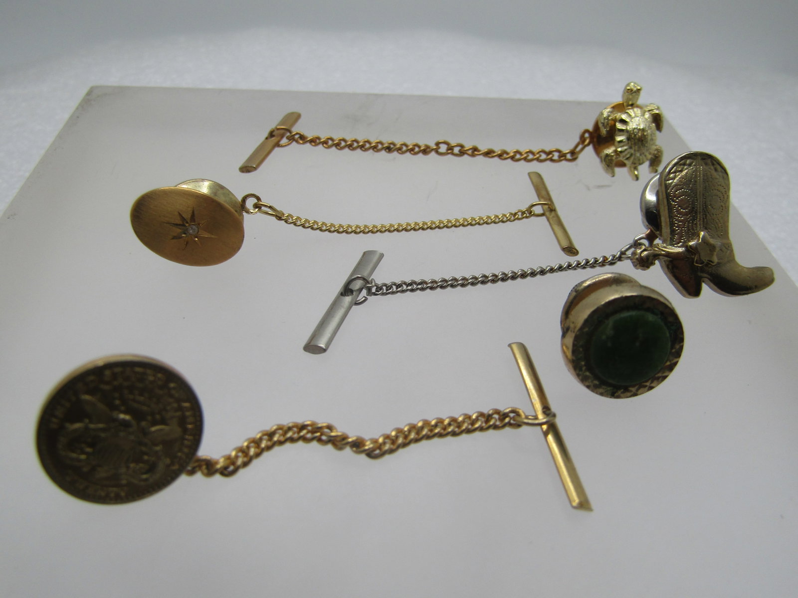 Vintage 5 Tack Pin Lot, Men's 1960's-1970's: Title: Vintage 5 Tack Pin Lot, Men's 1960's-1970's Description: Vintage 5 Tack Pin Lot, Men's 1960's-1970's. Gold tone for all, cowbow boy with bar and chain; turtle with bar and chain signed Nemo; U.