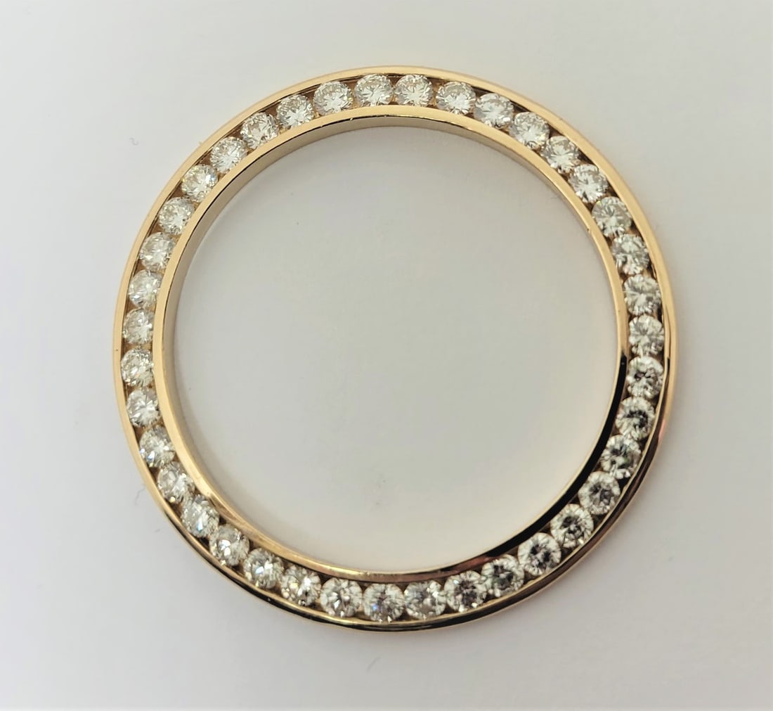 14k Yellow Gold Bezel 38.5 mm for ROLEX 36 mm with 3.2 CT TW Diamonds G/SI1: 14k Yellow Gold Bezel 38.5 mm for ROLEX 36 mm with 3.2 CT TW Diamonds G/SI1 * Solid 14k yellow gold Bezel for Rolex in shiny finish with brilliant cut natural diamonds set in channel setting. * Total 