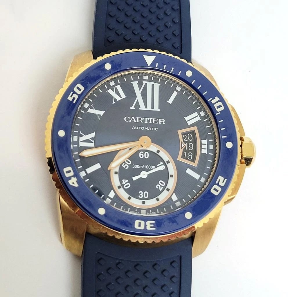 18k Rose CARTIER CALIBRE Blue Dial Automatic Mens Watch Ref 3730* 42MM EXLNT: This Men's CARTIER watch is Swiss made. . . Great present for yourself or someone you love! . . . * Solid 18k rose gold case & back in matte finish * Rotating bezel with blue ceramic *Back cover with