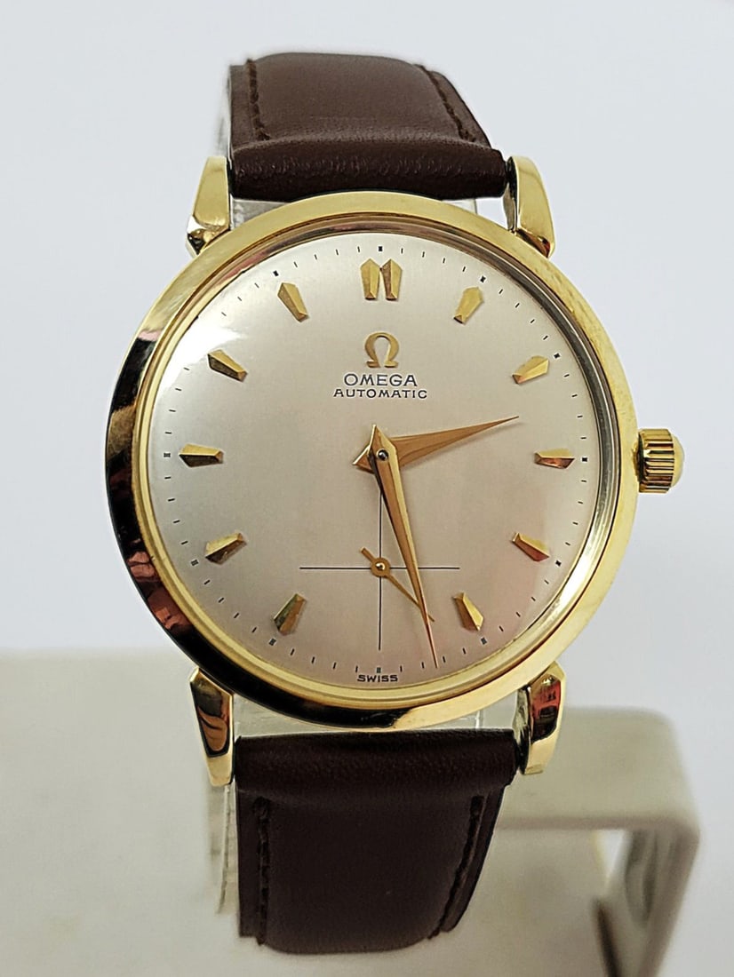Solid 18k OMEGA Men's AUTOMATIC Watch* Cal 28.10.RA.SC.PC c.1944* EXLNT SERVICED: Solid 18k OMEGA Men's AUTOMATIC Watch* Cal 28.10.RA.SC.PC c.1944* EXLNT SERVICED? ?? This Men's Omega watch is Swiss made. Great present for yourself or someone you love as well as for vintage collect