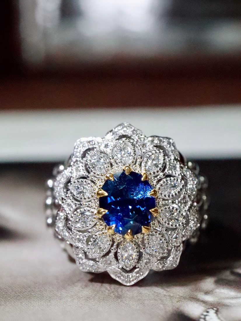 Platinum Natural Sapphire Diamond Ring: Title: Platinum Natural Sapphire Diamond Ring Description: This ring perfectly combines modern and classical elements, showcasing a unique exotic charm. The elegant line design complements the exquisi