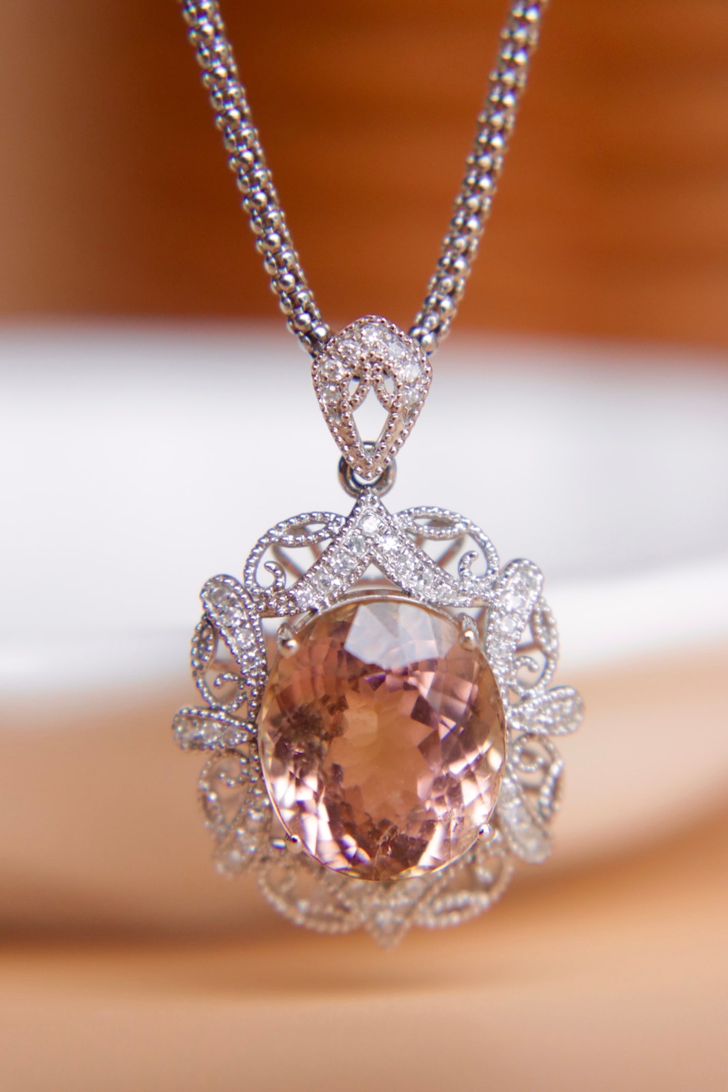 18K Gold Natural Yellow Tourmaline Pendant: Title: 18K Gold Natural Yellow Tourmaline Pendant Description: This 18K gold pendant features a 7.4-carat natural yellow tourmaline as the main stone, with dazzling diamond embellishments that enhance