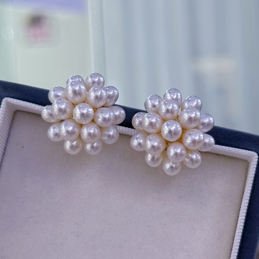 Natural Flawless White Pearl Earrings: Title: Natural Flawless White Pearl Earrings Description: These earrings feature natural flawless white pearls, with an exquisite popcorn firework design that showcases a unique elegant temperament. E