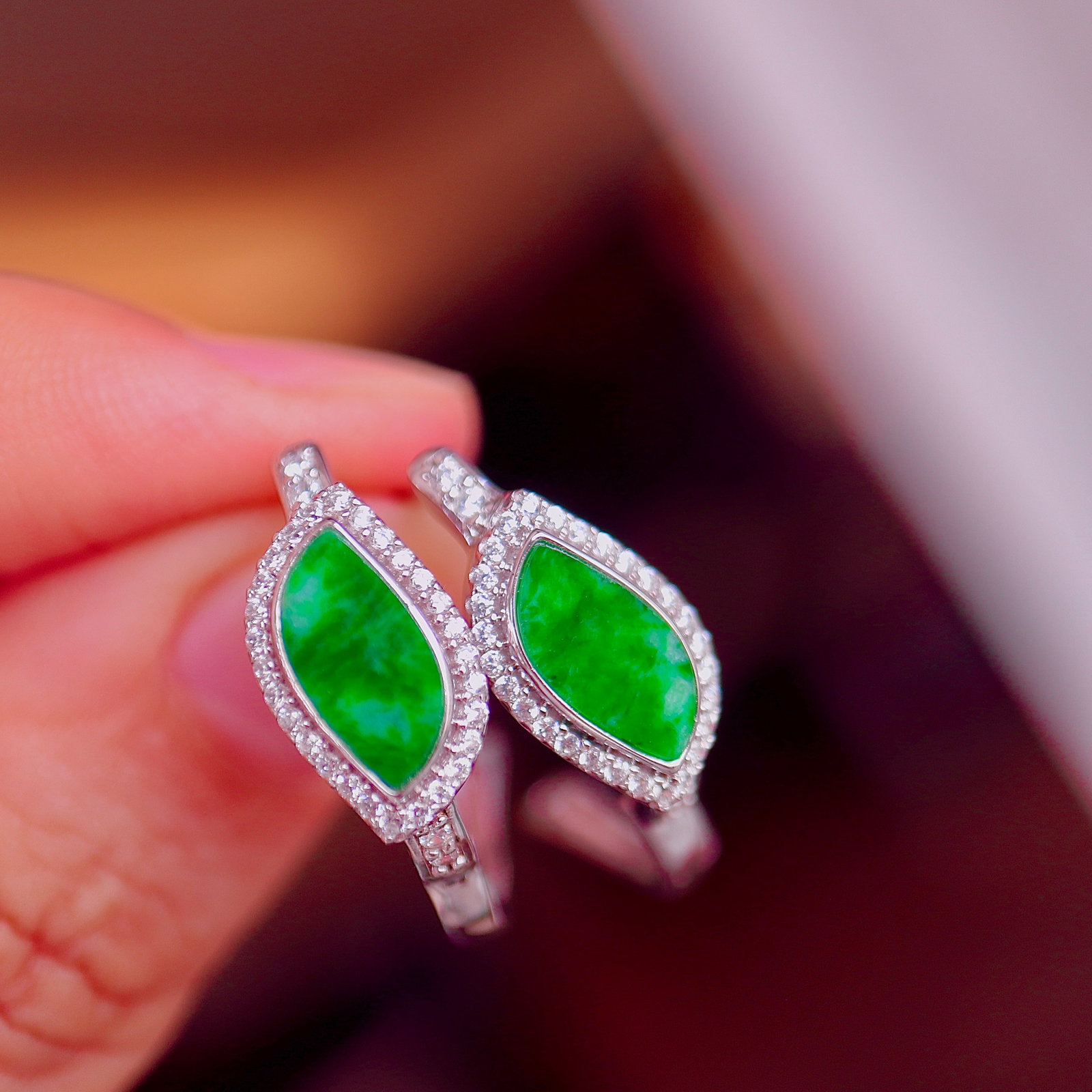 Natural Full Green Jade Ear Bags: Title: Natural Full Green Jade Ear Bags Description: These ear bags feature natural full green jade as the main stone, showcasing an elegant marquise shape. The exquisite design is complemented by