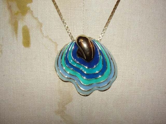 Diane Von Furstenburg Enameled Shell Pendant Necklace: Title:Diane Von Furstenburg Enameled Shell Pendant Necklace Description:Gorgeous and rare. Circa 1970's. From the early year of DVF's jewelry production, which recently relaunched after being dormant
