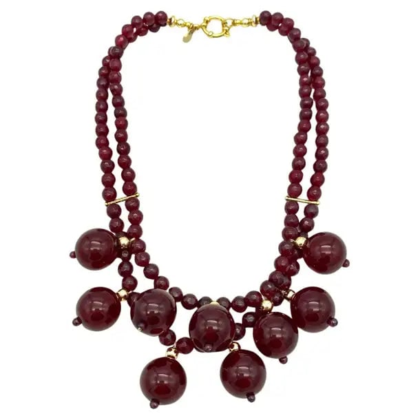 Cherry Bakelite and Gold Filled Necklace: We created this double strand necklace with nine 19mm large cherry bakelite charms wired on to the two 8mm faceted garnet strands. This necklace is completed with a 14K gold filled spring ring clasp
