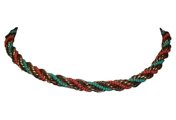 Lanvin Twisted Rope Necklace: Title:Lanvin Twisted Rope Necklace Description:1960s Lanvin goldtone rope necklace with 18 kt gold plating and red and blue glass seed beads. Marked with hang tag, "Lanvin, Paris". Closes with spring