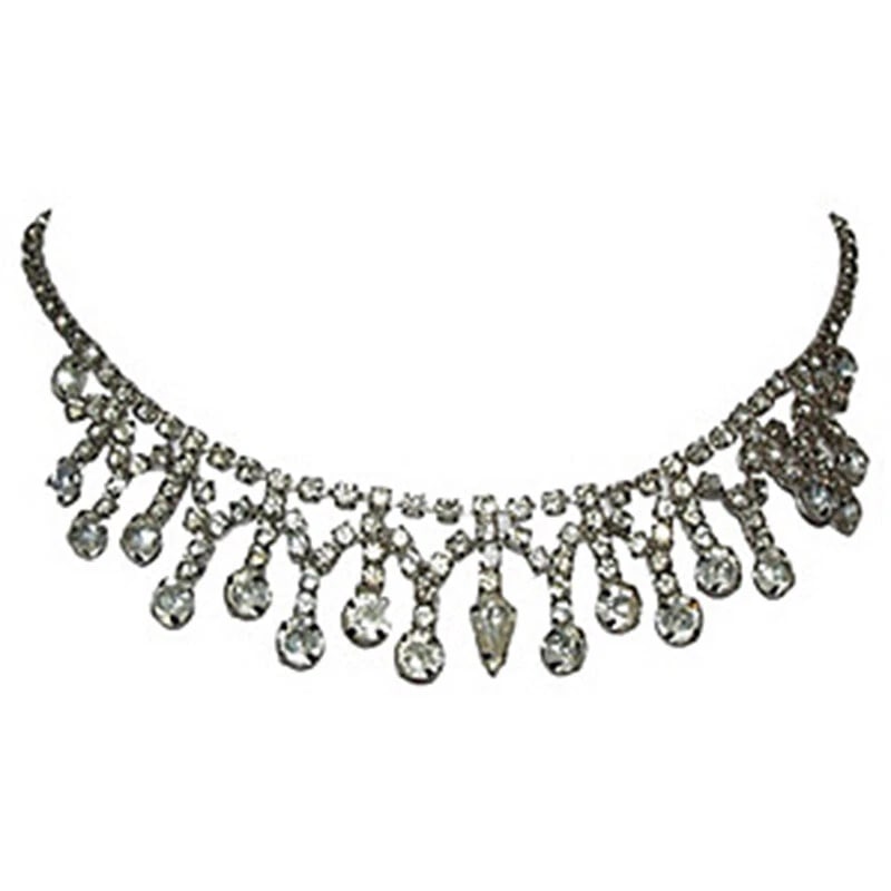 Rhinestone Fringe Bib Necklace: Title:Rhinestone Fringe Bib Necklace Description:Clear rhinestone and silvertone metal bib necklace, circa 1950. Box clasp closure. Reserve: $151.00 Shipping: Domestic: Flat-rate of $9.00 to anywhere