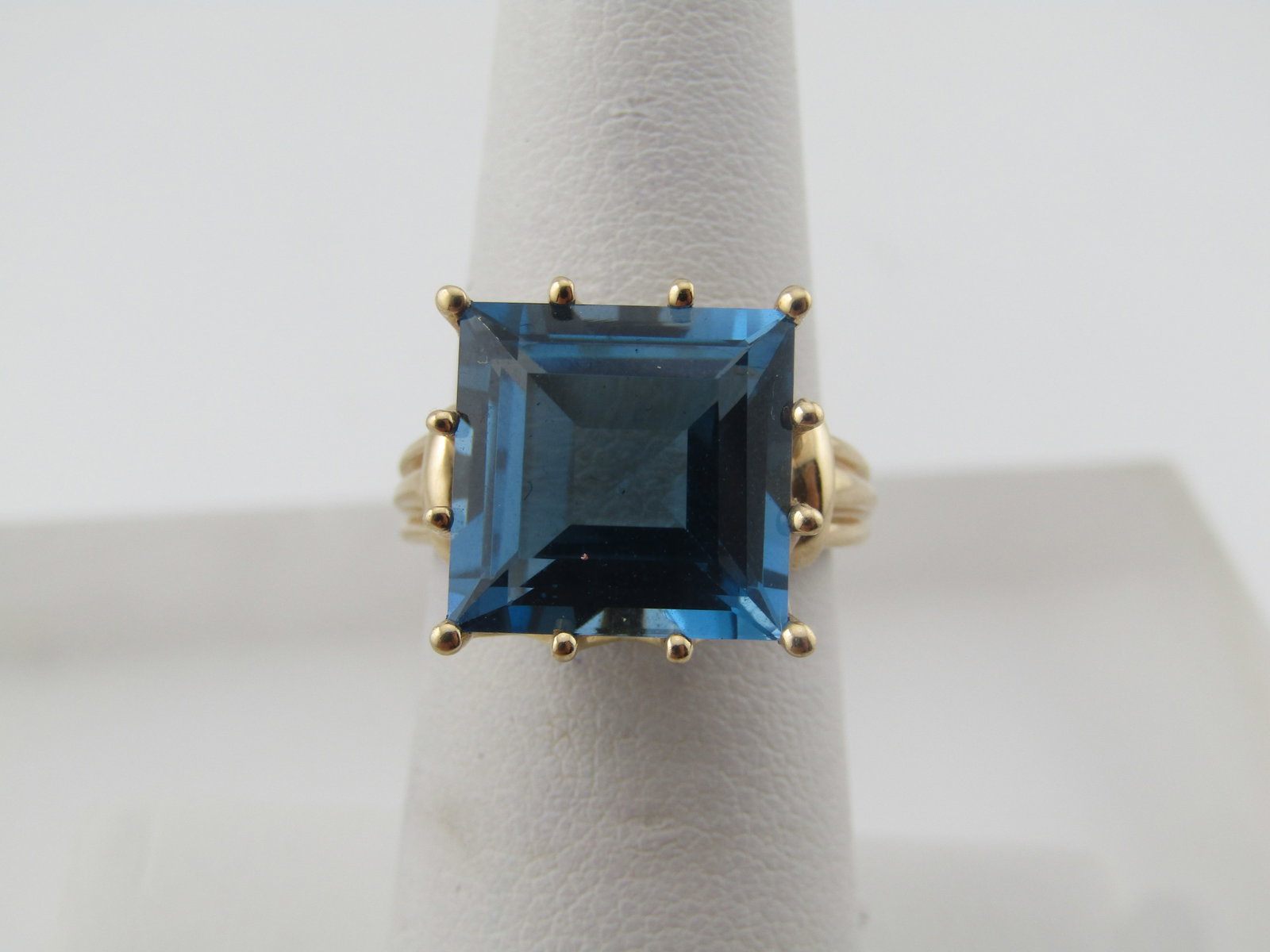 Vintage 10kt Blue Topaz Square Ring, Sz. 6, 7.8 CTW, Signed MEDA: Title: Description: Reserve: $590.00 Shipping: Domestic: Flat-rate of $14.00 to anywhere within the contiguous U.S. International: Foreign shipping rates are determined by destination. International