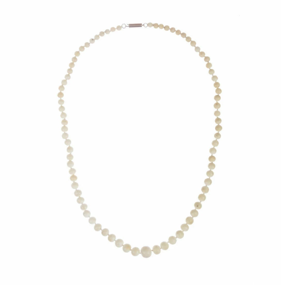 Angel Skin Coral Graduated Bead Necklace: Title:Angel Skin Coral Graduated Bead Necklace Description:Nicely knotted on silk and recently restrung with a 14 kt gold clasp. Circa, 1930’s. Necklace measures 20” long. Beads graduate from 