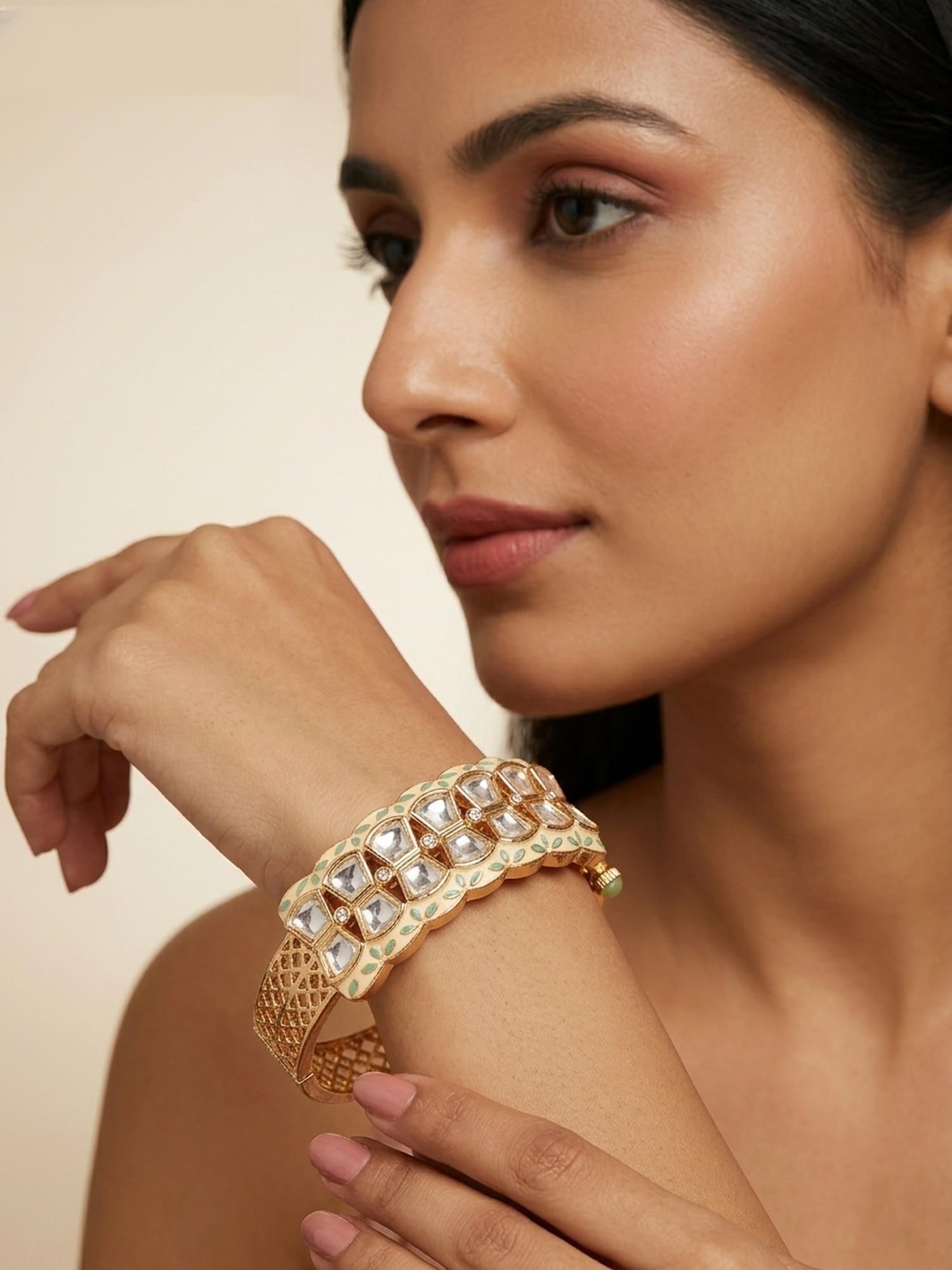 Pastel Meenakari Style Kundan Openable Bracelet: Title:Pastel Meenakari Style Kundan Openable Bracelet Reference:itemcode : JA0230 Reserve: $41.00 Shipping: Domestic: Flat-rate of $12.00 to anywhere within the contiguous U.S. International: Foreign