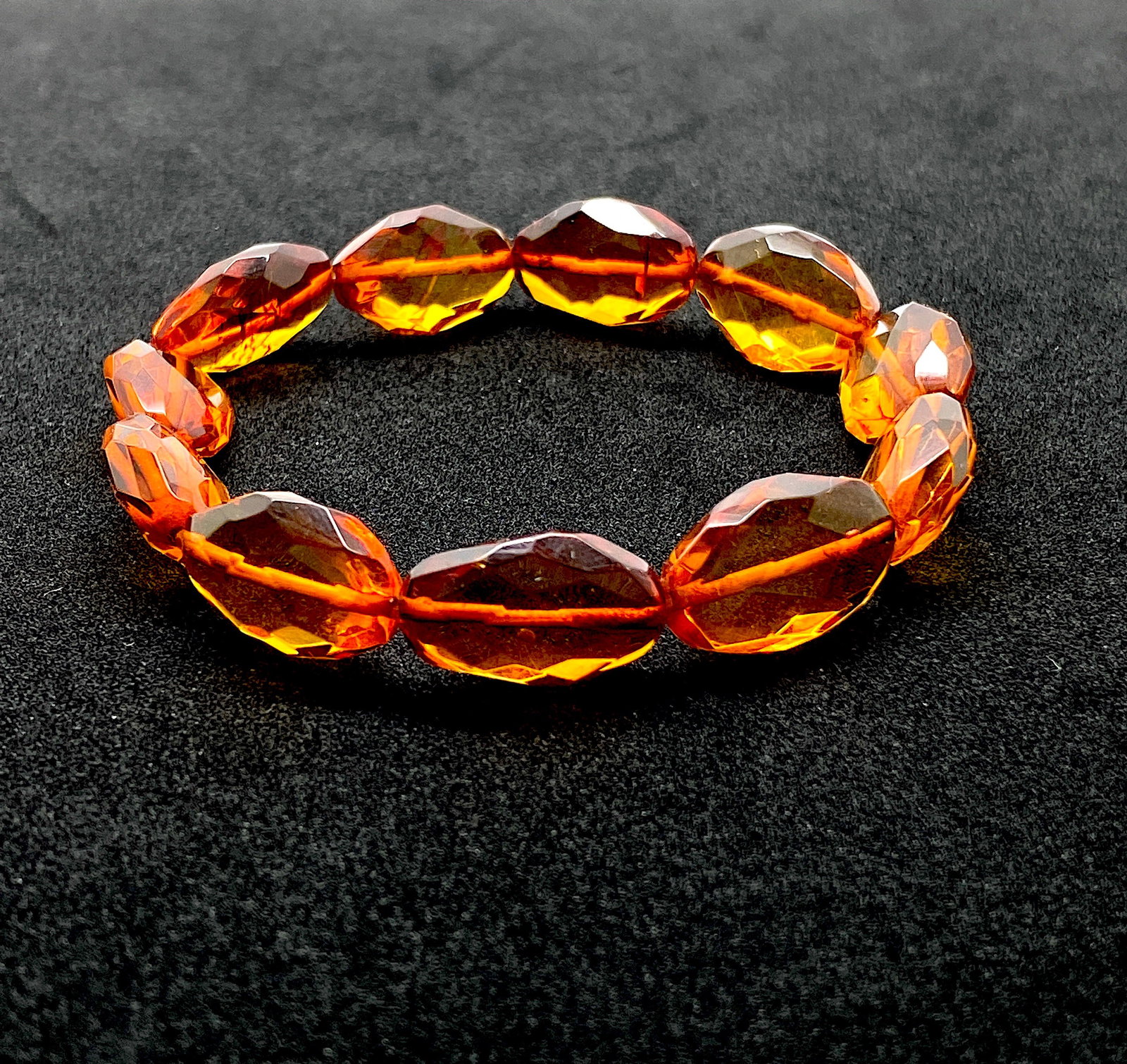 Splendid Amber Bracelet made from Hand Carved Amber beads: Title:Splendid Amber Bracelet made from Hand Carved Amber beads Metal:None Gemstone:Amber Weight:8.4 g Size:Bead size: 12.0 x 18.0 mm Bead size: 0.472 x 0.709 inches Made of:(Reconstituted Amber or