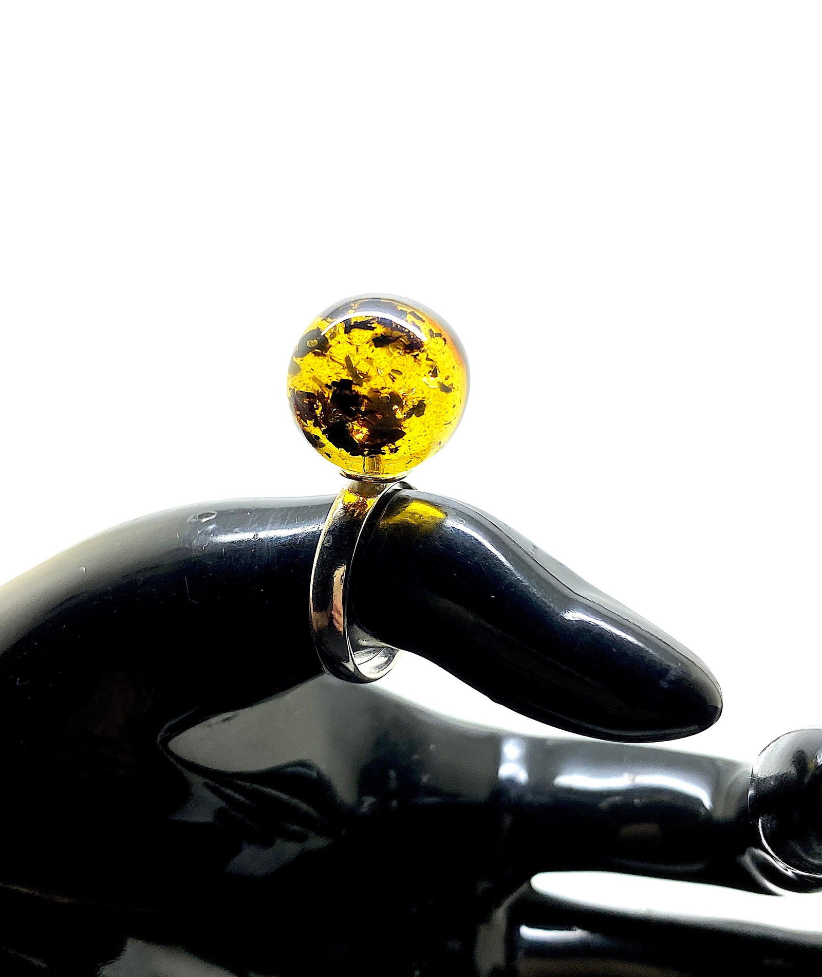 Unique and Amazing Amber Ring: Title:Unique and Amazing Amber Ring Metal:Sterling Silver Gemstone:Amber Weight:4.18 g Size:Inner diameter: 16.0 mm Size: 33.0 x 19.0 x 15.0 mm Size: 1.299 x 0.748 x 0.591 inches Inner diameter: 0.63 