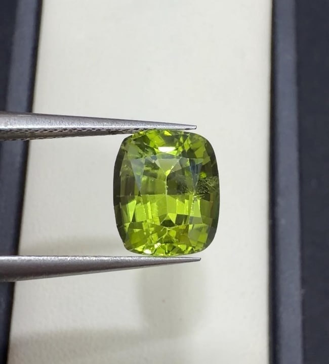Natural Green Peridot Cushion Cut Gemstone For Jewelry - 3.30 Carat: Peridot Details * Weight : 3.30 carat * Dimension : 9.4*7.9*5.9 MM * Color : Apple Green * Shape : Cushion * Hardness : 6.5 - 7 * Mineral Class : Olivine * Mine: Sapat * Origin : Pakistan * Associated