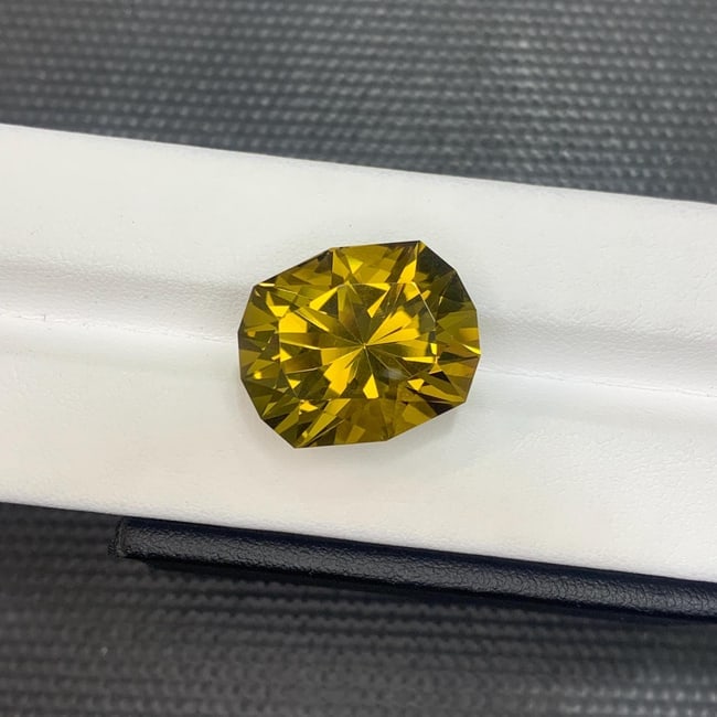 Oval Cut Madeira Citrine Gemstone: 23.92 ct Anniversary Jewelry: Sunset in Your Hands! "A rare find, perfect for a statement piece of jewelry!" This fancy Oval cut citrine is a rare find, boasting a uniform bright orange colour that's sure to captivate. The