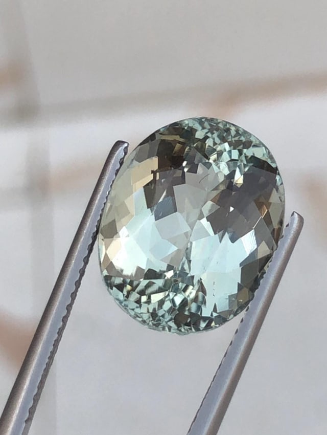 Natural Green Beryl Oval Cut Gemstone From Skardu Pakistan - 11.780 Carat: Aquamarine Details: * Weight : 11.780 carat * Dimension : 15.3*12.3*10.4 mm * Shape : Oval * Color : Green * Origin : Skardu, Pakistan * Mineral Class : Beryl * Certificate : On Customer Demand * SKU
