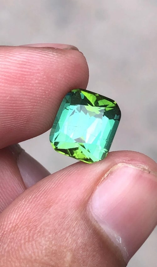 Natural Mint Green Tourmaline Cushion Cut Gemstone For Ring - 4.30 Carat: Weight : 4.30 Carat Dimensions : 10*9*6.3 MM Shape : Cushion Cut Clarity : VS Color : Mint Green ( Jaba Green ) Treatment : None Origin : Afghanistan Hardness : 7.5-8 Family : Elbaite SKU : E ( G ) Re