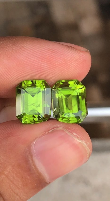 Jewelry Size Natural Green Peridot Pair Emerald Gemstone From Sapat Valley - 10.210 Carat: Gemology: * Weight : 10.210 carat * Dimension : 10.9*8.5*6.6 MM & 10.9*8.5*6.7 mm * Color : Green * Clarity : VS * Shape : Emerald Cut * Hardness : 6.5 - 7 * Mineral Class : Olivine * Mine: Sapat *