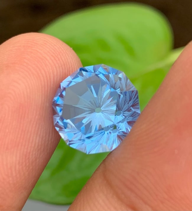 Swiss Blue Topaz Gemstone: 10.80 Carat Flower Cut Loose Stone: Highlights Supplies for making crafts Materials: Gemstone: Topaz Carat weight: 10.80 Precision Fancy Flower Cut Swiss Blue Topaz Loose Gemstones Wight - 10.80 Carats Dimensions : 12.2*12.2*8.5 mm