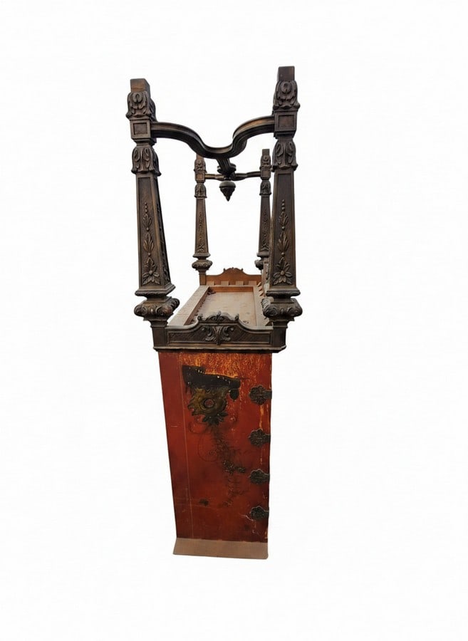 Asian-Style Carved Wood and Lacquered Cabinet: This cabinet features ornate carved wood accents in a dark finish, possibly mahogany or walnut, contrasting with vibrant red lacquered panels. The panels are decorated with Asian-inspired motifs of bi