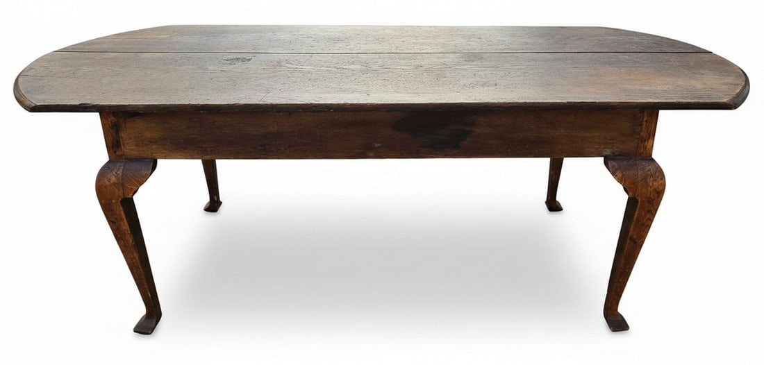 Rustic Wooden Console Table with Cabriole Legs: This rustic console table features a rich, dark wood with visible grain and natural imperfections, suggesting an antique or vintage origin. The top consists of multiple planks, and the table is