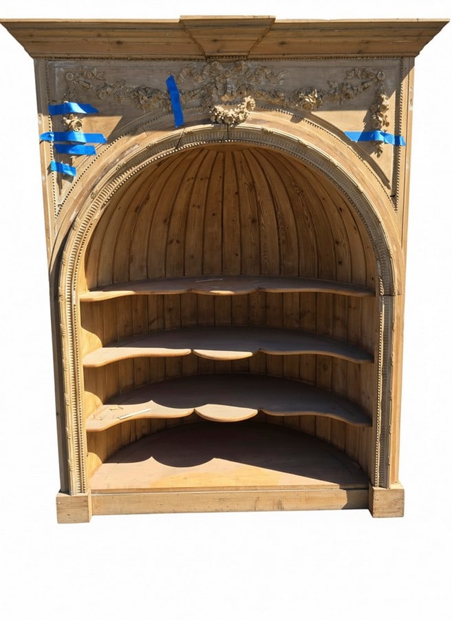 Continental Carved Pine Domed Cabinet / Bookcase: This continental carved pine cabinet features a striking domed top section with intricate carvings, including floral and foliate motifs. The interior boasts multiple shaped shelves, ideal for