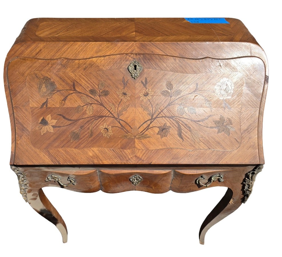 French Rococo Style Inlaid Marquetry Serpentine Secretary Desk: A beautiful French Rococo style secretary desk, featuring a serpentine front and elaborate floral marquetry inlay across the fall-front writing surface. The desk is crafted from various wood veneers,