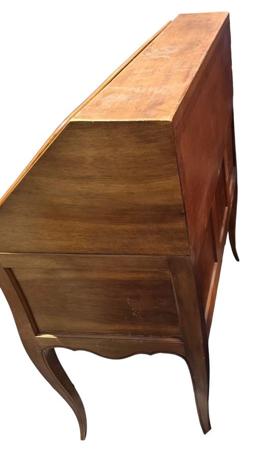 French Provincial Style Slant-Front Desk: A charming French Provincial style slant-front desk, likely crafted from fruitwood or a similar light-toned hardwood. The desk features a hinged fall-front surface that opens to reveal a writing area