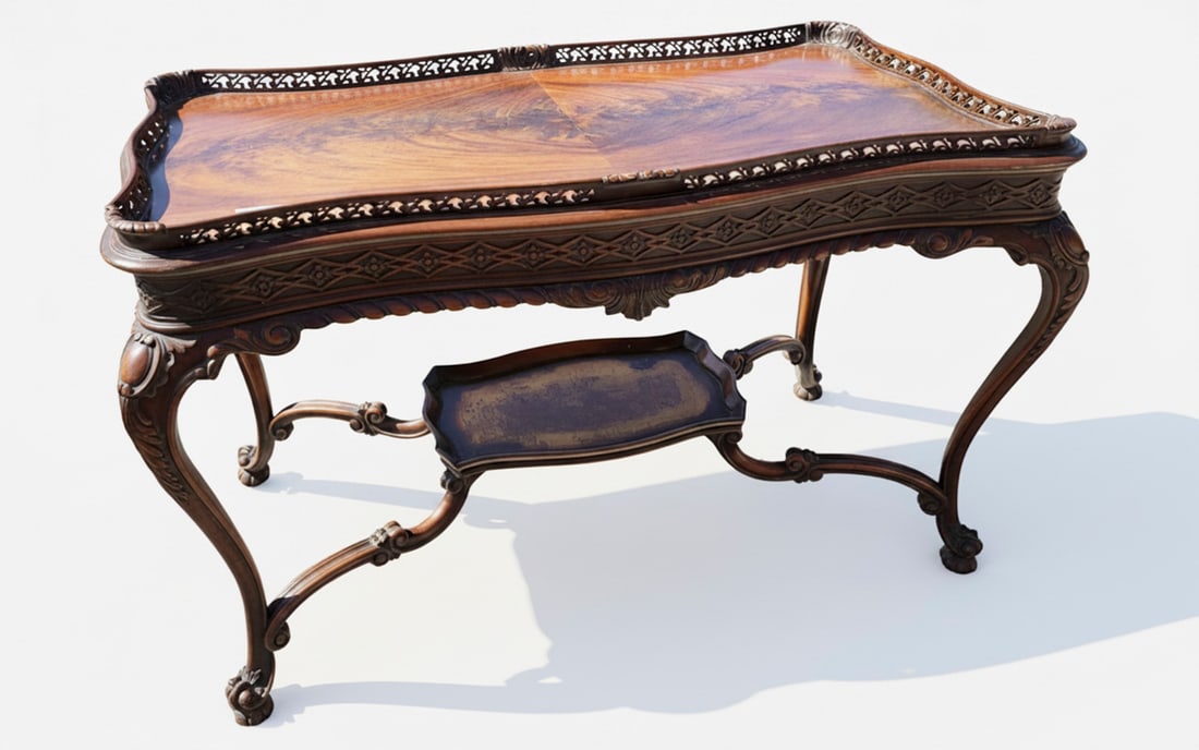Chippendale Console Tea/Coffee Table: This vintage tea table features intricate carved wood details, a shapely reticulated gallery top, and cabriole legs. The wood grain on the top is highly figured, suggesting a high-quality veneer. A sm