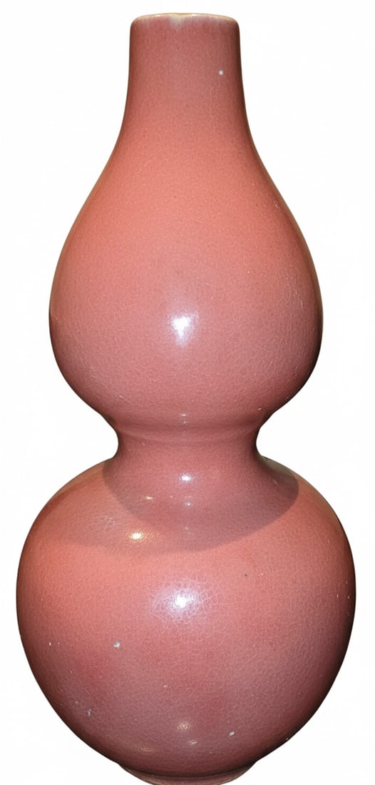 Chinese Sang de Boeuf Gourd Vase: This is a charming Chinese sang de boeuf glazed ceramic vase in the shape of a double gourd. The glaze features a rich, mottled reddish-pink color with a subtle crackle finish, characteristic of