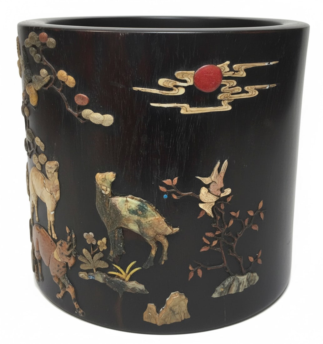 Chinese Zitan Wood Scroll Pot (Bitong): This cylindrical brush pot is crafted from a dark, finely-grained hardwood, likely rosewood or zitan, and features intricate inlay work. The design depicts a traditional Chinese landscape scene with