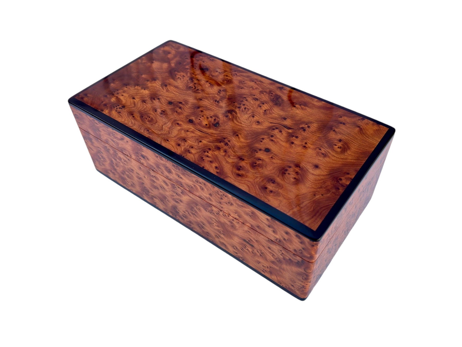 Handcrafted Thuya Burl Wood Jewelry Box: Thuya Burl Wood Jewelry Box is a carefully crafted piece combining practical function with a distinctive, timeless design. Measurements: Length: 25 cm; Width: 15 cm; Height: 9 cm; Dimensions: 10 × 6"