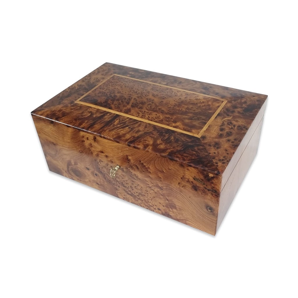Lockable Thuya Burl Wood Jewelry Box: Lockable Thuya Burl Wood Jewelry Box is a carefully crafted piece combining practical function with a distinctive, timeless design. Measurements: Length: 30 cm; Width: 20 cm; Height: 11 cm. Material: