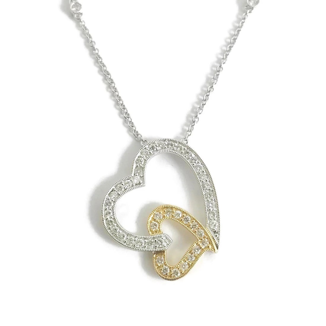 Diamond Double Open Heart Two-Tone Pendant Necklace 18K White Yellow Gold .55 TW: Title: Diamond Double Open Heart Two-Tone Pendant Necklace 18K White Yellow Gold .55 TW Description: Diamond Double Open Heart Two-Tone Pendant Necklace 18K White Yellow Gold .55 TW Make a statement