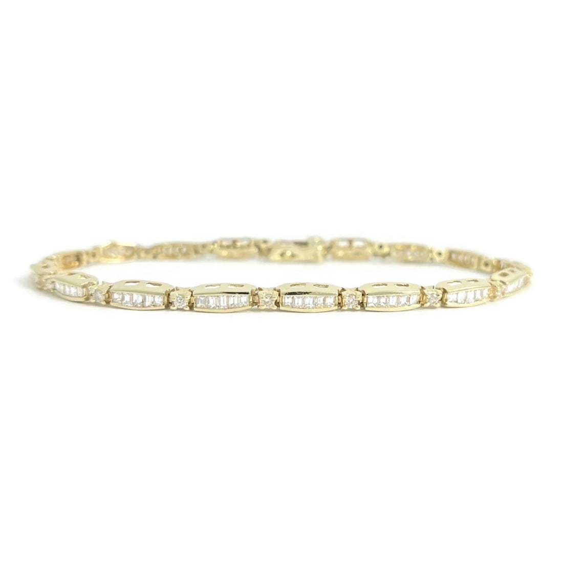 Estate Baguette Round Diamond Tennis Bracelet 14K Yellow Gold, 2.15 CTW, 9.44 Gr: Title: Estate Baguette Round Diamond Tennis Bracelet 14K Yellow Gold, 2.15 CTW, 9.44 Gr Description: Estate Baguette Round Diamond Tennis Bracelet 14K Yellow Gold, 2.15 CTW, 9.44 Gr This is a