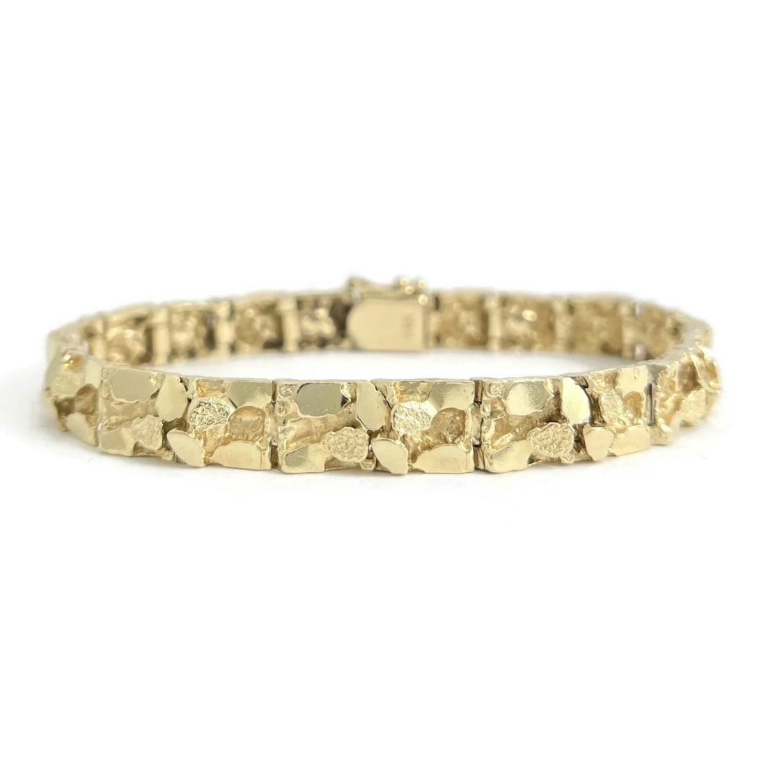 Vintage 1970's Men's Nugget Bracelet 14K Yellow Gold, 7 Inches, 25.86 Grams: Title: Vintage 1970's Men's Nugget Bracelet 14K Yellow Gold, 7 Inches, 25.86 Grams Description: Vintage 1970's Men's Nugget Bracelet 14K Yellow Gold, 7 Inches, 25.86 Grams This is a unique vintage bra