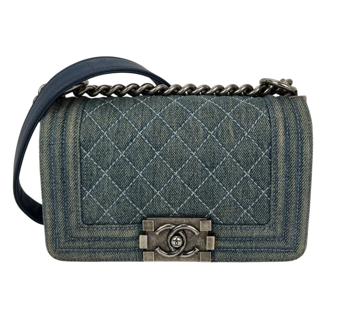 Chanel Denim Quilted Small Blue Boy Flap: Title: Chanel Denim Quilted Small Blue Boy Flap Description: Pre-Owned 100% Authentic Chanel Denim Quilted Small Blue Boy Flap RATING: B...Very Good, shows some signs of wear MATERIAL: denim, leather 