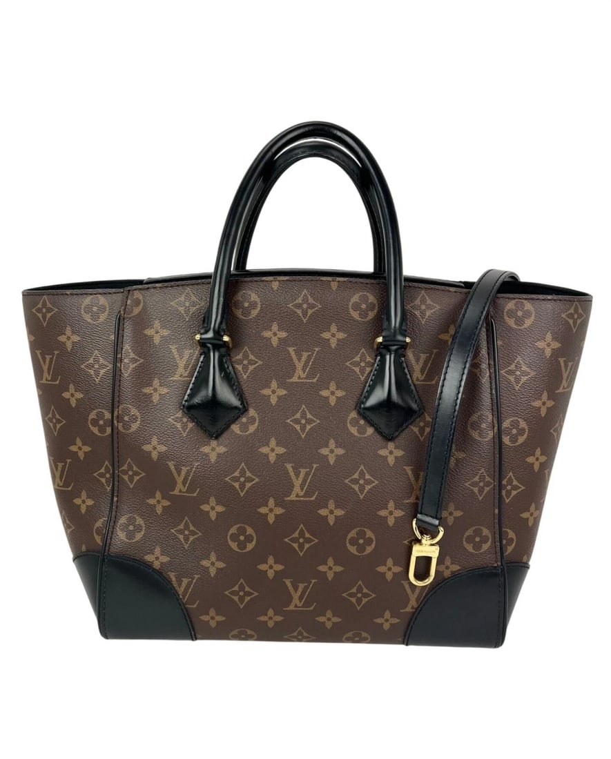 Louis Vuitton Phenix Monogram Leather Tote Bag: Title: Louis Vuitton Phenix Monogram Leather Tote Bag Description: Pre-Owned 100% Authentic Louis Vuitton Phenix Monogram Leather Tote Bag RATING: B...Very Good, well maintained, shows minor signs of