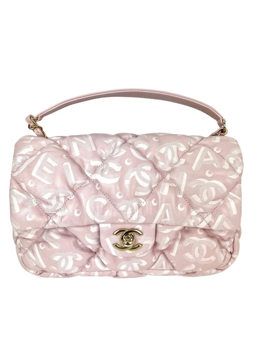 Chanel Printed Calfskin Quilted Medium Puffy Bubbly CC Pink Flap Bag: Title: Chanel Printed Calfskin Quilted Medium Puffy Bubbly CC Pink Flap Bag Description: Pre-Owned 100% Authentic Chanel Printed Calfskin Quilted Medium Puffy Bubbly CC Pink Flap Bag RATING: B+...Very